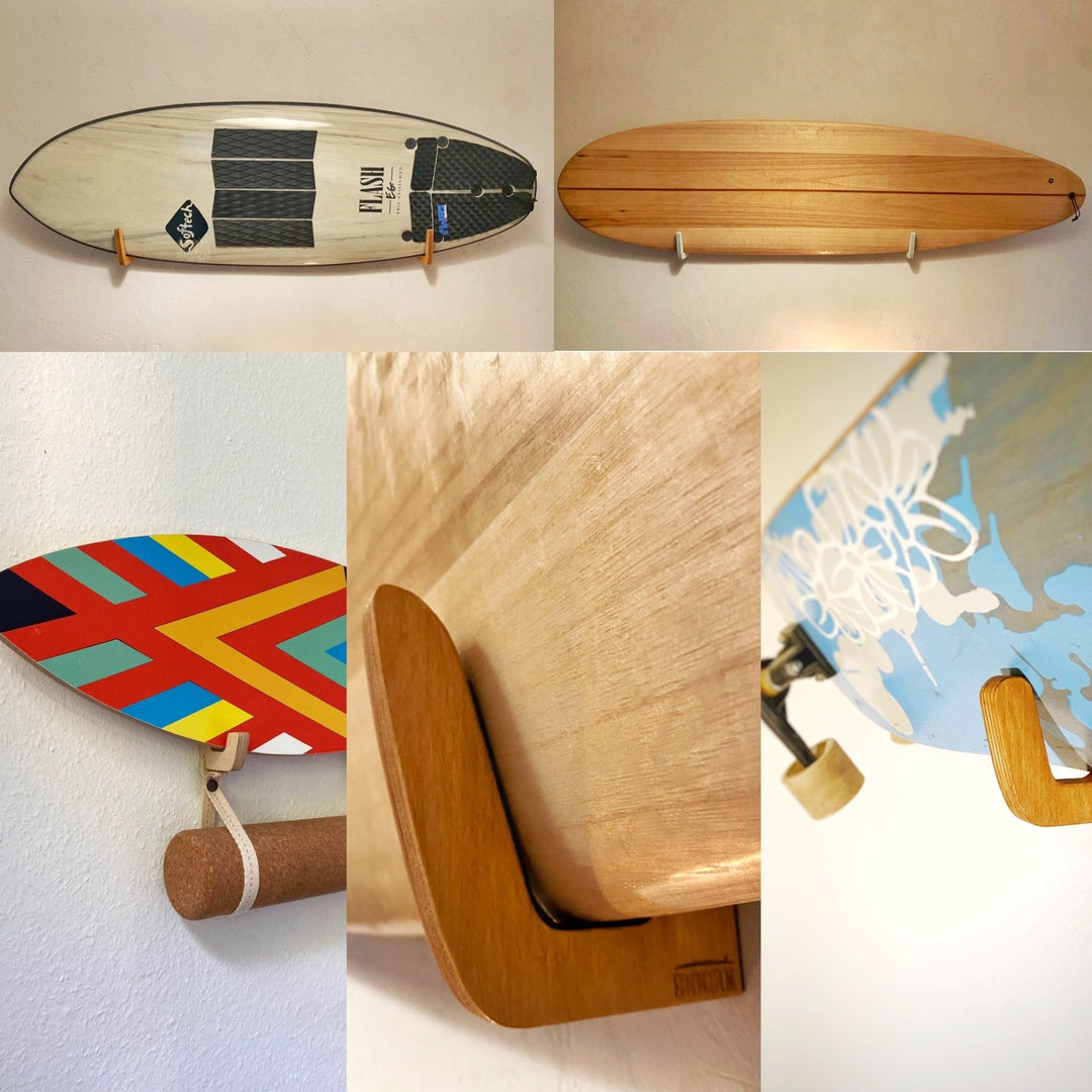 mehrere Surfboards, ein Skateboard und ein Balanceboard an der Wand aufgehangen mit Holz Wandhalterungen
